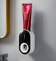 Automatic Toothpaste Dispenser Wall Mounted Toothpaste Squeezers Dust-proof Toothpaste Holder. 