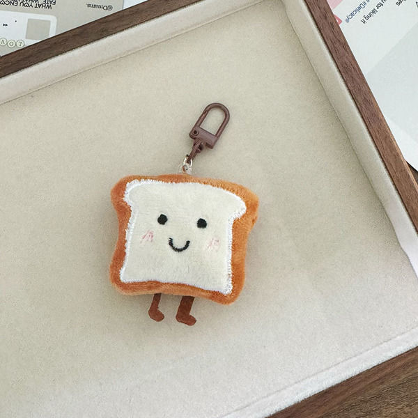 Toast%20Cartoon%20Plush%20Keychain%20%E2%80%93%20Cute%20Rice%20/%20Toast%20Bunch%20Expression%20Pendant%20for%20Bags,%20Gifts%20&%20Students%E2%80%9D%20-%20Image%205