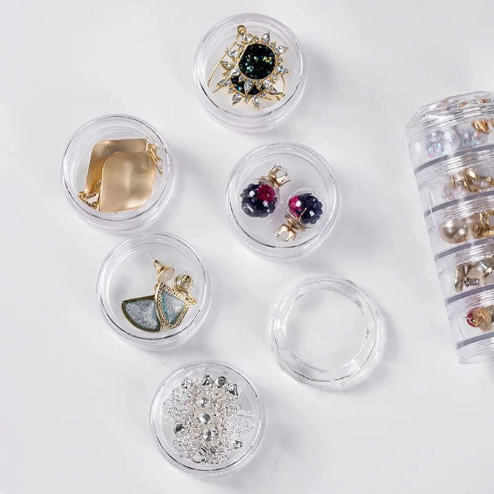 Mini%20Round%20Jewelry%20Storage%20Box%20(5%20Layer)%20%E2%80%93%20Transparent%20Acrylic%20Organizer%20for%20Rings,%20Earrings,%20Studs%20&%20Small%20Accessories%20%7C%20Compact%20360%C2%B0%20Rotating%20Jewelry%20Case%20for%20Dressing%20Table%20&%20Travel%20-%20Image%207