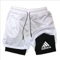 2-in-1 running shorts, suitable for men's fitness leggings, with phone pocket and simple letter print for summer sports pants.