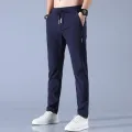2024 Ice Silk Men's Pants Summer New Black Gray Thin Business Casual Pants Outdoor Elastic Breathable Straight Leg Sweatpants. 