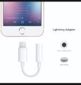 Bluetooth Lighiting to 3.5mm headphone jack concter adapter. 