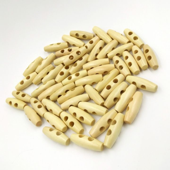 50Pcs/Bag%20Wood%20Olive%20Button%20Horn%20Toggle%20Buttons%2030*10mm%20Cloth%20Accessories%202%20Holes%20for%20Coats%20Sweater%20Sewing%20Craft%20Decor%20-%20Image%204