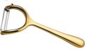 golden potato peeler and vegetable grater. 