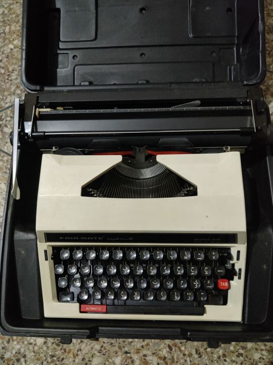 original Arabic typewriter with case