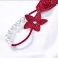 T SHAP FRONT EMBROIDERY AND BACK NET FANCY PANTY. 
