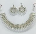 Maroon colour jewellery set of round crystal earrings and chowker neckless in maroon colour for girls and women for wedding party and eid in low price. 