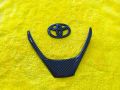 Toyota Yaris 2019-2024 Carbon Fiber Steering Logo + Steering Trim Carbon Fiber (Combo Pack). 