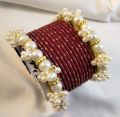 Trendy bangles set with pearl bangles golden dotted pearl bangles set bangles for girls in all sizes and colors gajra bangles set. 