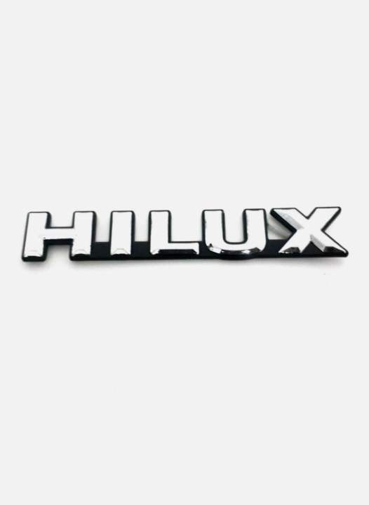 HILUX%20CHROME-BLACK%20LOGO%20EMBLEM%20BADGE%20FOR%20TOYOA%20HILUX%20LN85-106%20MIGHTY-X%20PICKUP%20-%20Image%202