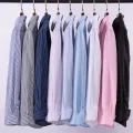 Men Formal Shirt Long Sleeve Office Solid Color Striped Anti-Wrinkle Non-ironing Fashion Business Pocket White Social Shirt 4XL. 