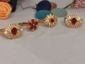 1k  bridal gold ring with maroon stone.. 