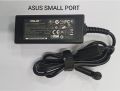 ASUS laptop AC adapter, commonly known as a charger. . 