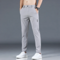 2024 Summer New Thin Ice Silk Stretch Men's Pants Casual Elastic Waist Smooth Trouser Pants Male Brand Clothing 5 Colour. 