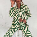 2022 Cross border Hot Edition Street Trendy Print Trouser Set Long Sleeve Full Screen Print Off Shoulder Shirt Set. 