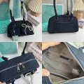 Cicelle shoulder bag oven modern denim fabric with Pearl knot pendant. 