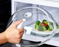 Microwave Food Splash Guard High Temperature Resistant Food Heating Cover with Steam Vent and Handle Transparent Plate Cover. 