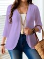 Plus-size women's open-front cardigan, lightweight 3/4 sleeve casual jacket, solid color layering fashion.. 