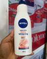 Nivea Body Lotion Extra Whitening Cell Repair & UV Protect SPF 15 400ml ALL SKIN TYPE. 