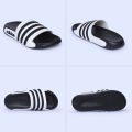Stridez Classic Triple-Line Slides – Black & White Edition.