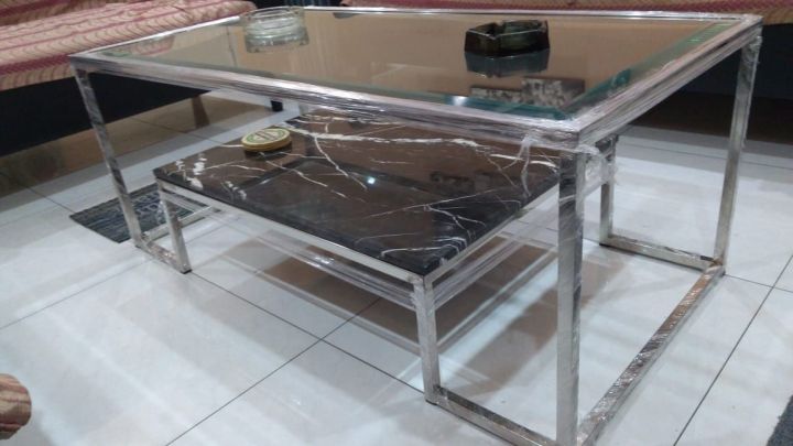 Centre%20Tabel%20Stainless%20Steel%20Upper%20Top:%208mm%20Glass%20Top%20With%20Beveled%20corners.%20Lower%20Top:%20Marbel%20Top%20with%20Diamond%20Shape%20corners.%20Measurements:%20Length%2048%20inches%20Width%2024%20inches%20Height%2018%20inches%20-%20Image%203