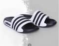 New Original Adidas Classic Black & White Triple-Line Slides – Trendy Casual Slip-On Sandals for Men & Women | Lightweight, Comfortable & Stylish Footwear. 