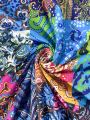 Women's Vibrant Paisley Pattern Sleeveless Jumpsuit for Spring/Summer Casual Wear.