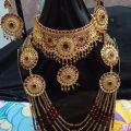 Bridal Jewellery set in Red and Golden colour with beautiful Crystal mala, bindeya and jhumer. 