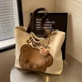 Cartoon Bear Canvas Shoulder Bag Handbag Large Capacity Tote School Bag Tutoring Bag Casual Commuting Bag Underarm Bag. 