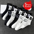 Random multiple pairs of men's crew socks graffiti ghost face unique street trend moisture wicking. 