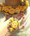 Artificial flower bridal jewellery set made with polyster fabric it includes (  earings,ring,tika,bracelet ,necklece). 