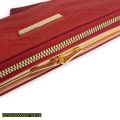 woman lining clutch. 