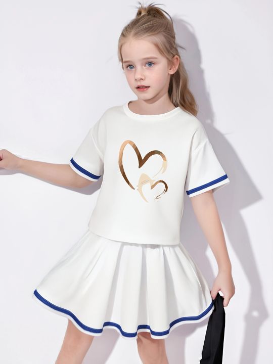 Summer girls' sporty style two-piece set with heart cartoon pattern print, pleated short skirt and short-sleeved T-shirt