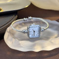 New Fashionable Casual Digital Square Miniature Ladies Quartz Watch Open-Ended Bracelet Watch Stylish Compact Timepiece. 