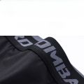 Mens Gym Shorts with Pockets Workout Compression Leggings for Men Polyester Boxer Briefs Running Basketball Athletic Tights. 