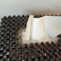 Tissue box with beads. 