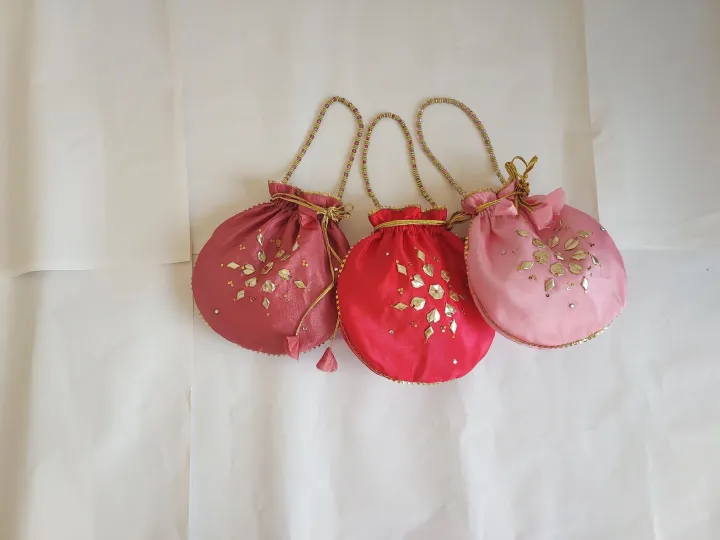 Fancy%20embroidered%20clutch/potli%20bag%20for%20wedding%20parties%20designer%20traditional%20potli%20gol%20bag%20with%20Handmade%20Gota%20work%20-%20Image%206