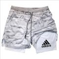 2-in-1 running shorts, suitable for men's fitness leggings, with phone pocket and simple letter print for summer sports pants.