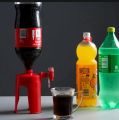 Fizzy drink bottle dispenser, upsidedown drinks dispenser, Coke bottle dispenser, Soda bottle hand press drinking fountain. 