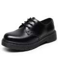 Black half lessup martin shoes. 