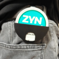 ZYN Car Visor Clip - Durable plastic for ZYN cans, compatible with most car visors for quick access and stylish storage. 
