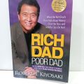 RICH  DAD poor dad by Robert t, kiyosaki. 