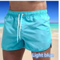 2024 Summer New Men's Shorts Beach Swimming Surfing Fast Drying Breathable Leisure Slow Running Fitness Loose Sports Shorts. 