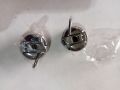 Sewing Machine Bobbin Cover and 2× Bobbin. 