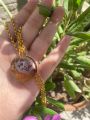 Resin pendant. 