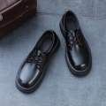 Black half lessup martin shoes. 