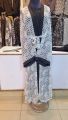 black dot abaya for girls white comfertable fabric. 