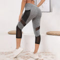 Mesh High Waist Yoga Pants Capri Leggings with Pockets for Women Tummy Control Workout Capri Leggings for Women.