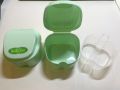 Polident denture box and regular denture box. 