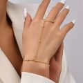 Stainless Steel All-Season Minimalist Hand Harness Bracelet for Women – Elegant Chain with Attached Finger Ring & Adjustable Fit. 